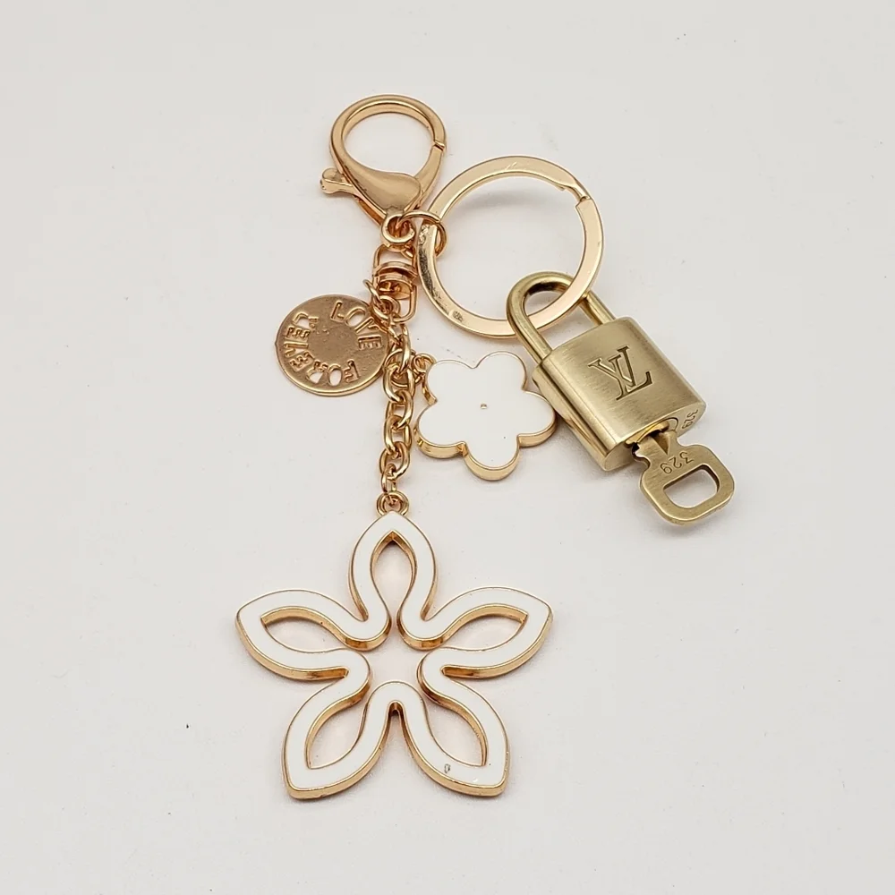 Authentic Louis Vuitton Gold Lock & Key 🔑 Bag Charm w/ Unbranded Clover Charm